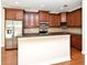 A bright kitchen featuring stainless steel appliances and plenty of cabinet space at 1649 Lake Baldwin Ln, Orlando, FL 32814