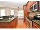 Updated kitchen with stainless steel appliances, granite countertops, and wood cabinets at 1649 Lake Baldwin Ln, Orlando, FL 32814