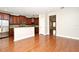 Spacious kitchen with stainless appliances, dark cabinets, and hardwood floors at 1649 Lake Baldwin Ln, Orlando, FL 32814