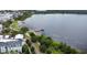 Scenic lakeside view with a walking path and gazebo on a pier at 1649 Lake Baldwin Ln, Orlando, FL 32814