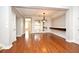Elegant living room with hardwood floors, decorative mirror and stairs to the next level at 1649 Lake Baldwin Ln, Orlando, FL 32814