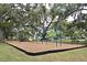 Community playground with slides, swings, and a safe, wood-chip ground cover at 1649 Lake Baldwin Ln, Orlando, FL 32814