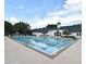 Community swimming pool featuring lap lanes and convenient ladder access at 1649 Lake Baldwin Ln, Orlando, FL 32814