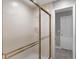 The bathroom has a framed sliding door leading to an adjacent room with a closet at 1717 Fountainhead Dr, Lake Mary, FL 32746