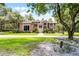 Beautiful brick home featuring a meticulously maintained lawn and mature landscaping at 1717 Fountainhead Dr, Lake Mary, FL 32746