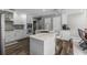 Modern kitchen featuring white cabinetry, stainless steel appliances, and marble countertops at 1717 Fountainhead Dr, Lake Mary, FL 32746