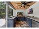 Outdoor kitchen equipped with a grill, sink, refrigerator and lots of countertop space at 1717 Fountainhead Dr, Lake Mary, FL 32746
