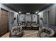 Home theater with reclining seats, projection screen, and acoustic panels for the perfect movie experience at 1717 Fountainhead Dr, Lake Mary, FL 32746