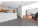 Open-concept living area with modern flooring and ample space for entertaining at 1731 Knotting Hill Dr, Orlando, FL 32835