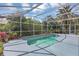 Inviting screened-in pool with surrounding patio, perfect for outdoor enjoyment at 1731 Knotting Hill Dr, Orlando, FL 32835