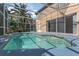 Enclosed pool featuring inviting water and access from a door to the home's interior at 1731 Knotting Hill Dr, Orlando, FL 32835