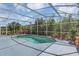 Inviting screened-in pool with surrounding patio, perfect for outdoor enjoyment at 1731 Knotting Hill Dr, Orlando, FL 32835