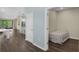 View of the bedroom showing the hardwood floors at 17860 Passionflower Cir, Clermont, FL 34714