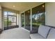 Screened patio with outdoor seating area at 17860 Passionflower Cir, Clermont, FL 34714