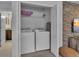 A convenient laundry area features a full-size washer and dryer within a closet space at 1935 Majorca Dr, Kissimmee, FL 34747