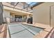 The enclosed pool and patio, perfect for outdoor enjoyment and relaxation, features a -safety fence at 1935 Majorca Dr, Kissimmee, FL 34747