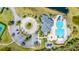 Aerial view of community pool, playground, parking and recreational amenities at 2031 Gloria Oak Ct, Orlando, FL 32820