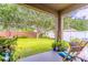 Relaxing backyard space with green grass and a lovely patio at 2031 Gloria Oak Ct, Orlando, FL 32820