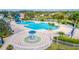 Community pool with a fountain feature, water slides, and many lounge chairs at 2031 Gloria Oak Ct, Orlando, FL 32820