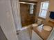 Bathroom featuring glass enclosed tiled shower, granite vanity, and ceramic tile floor at 2414 Willow Oak Dr, Edgewater, FL 32141