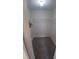 A walk-in closet with gray carpet and a wire shelving unit at 2414 Willow Oak Dr, Edgewater, FL 32141
