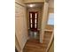 Inviting entryway featuring wood-look floors, a solid door with window accents, and neutral paint at 2414 Willow Oak Dr, Edgewater, FL 32141