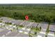 Beautiful aerial view of a home with professionally landscaped yard in a desirable community at 2698 River Creek Ln, St Cloud, FL 34771