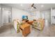Bright living room with ceiling fan and neutral flooring, creating a cozy and inviting atmosphere at 2698 River Creek Ln, St Cloud, FL 34771