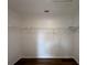 Walk-in closet with shelving, wood flooring and neutral colored walls at 3055 Kirkland St, Deltona, FL 32738