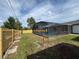 Enclosed in a screen cage, this pool is perfect for outdoor relaxation and recreation at 3055 Kirkland St, Deltona, FL 32738