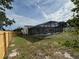 Screened-in pool offers a private outdoor space for year-round enjoyment at 3055 Kirkland St, Deltona, FL 32738