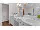 Elegant bathroom featuring double sinks and a vanity, offering plenty of space and storage at 315 Desoto Cir, Orlando, FL 32804