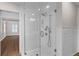 Modern bathroom with a glass-enclosed shower, featuring white subway tile and stylish fixtures at 315 Desoto Cir, Orlando, FL 32804