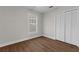 Cozy bedroom with a closet and a bright window allowing plenty of natural light at 315 Desoto Cir, Orlando, FL 32804
