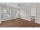 Bright bedroom with hardwood floors features two windows and modern lighting at 315 Desoto Cir, Orlando, FL 32804