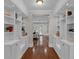 Hallway with custom built-in storage and seating at 315 Desoto Cir, Orlando, FL 32804