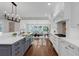 Modern kitchen with a large island, stainless steel appliances, and plenty of counter space at 315 Desoto Cir, Orlando, FL 32804