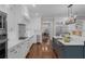 Well-equipped kitchen with stainless steel appliances, stone countertops, and custom cabinetry at 315 Desoto Cir, Orlando, FL 32804