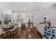 Open floor plan with modern living room and dining room, hardwood floors, and natural light at 315 Desoto Cir, Orlando, FL 32804