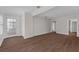 Well-lit living room featuring wood floors and an open layout, perfect for entertaining at 315 Desoto Cir, Orlando, FL 32804