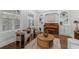 Comfortable living room with a piano, built-in shelves, and natural light at 315 Desoto Cir, Orlando, FL 32804