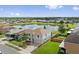 Aerial view of a two-story home with a well-manicured lawn and a tranquil lake in the background at 328 Fairfield Dr, Sanford, FL 32771