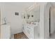 Bathroom featuring double sink vanity with modern fixtures and ample storage at 328 Fairfield Dr, Sanford, FL 32771