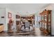 The dining area flows into the kitchen with a view of the outdoor living space at 328 Fairfield Dr, Sanford, FL 32771