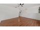 Open living area featuring wood floors and access to other parts of the home at 328 Fairfield Dr, Sanford, FL 32771