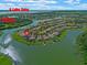 Stunning aerial view of lakefront homes in a beautiful community near Lake Toho and Bald Point Preserve at 3774 Eagle Isle Cir, Kissimmee, FL 34746
