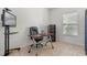 Home office with desk, office chair, a file cabinet and a window with natural light at 3774 Eagle Isle Cir, Kissimmee, FL 34746