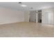 Expansive living room features tile flooring, neutral paint, and an open layout perfect for entertaining guests at 3774 Eagle Isle Cir, Kissimmee, FL 34746