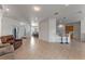 Open living space showcasing dining area, breakfast bar and living room for modern living at 3774 Eagle Isle Cir, Kissimmee, FL 34746