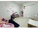 Spacious ' bedroom with ample storage, play areas, and a cozy beanbag chair at 4295 Twisted Twig Bnd, Kissimmee, FL 34746